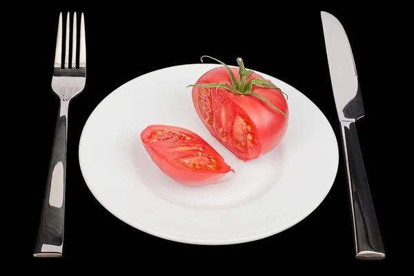 Rajčata na bílém talíři — Stock fotografie