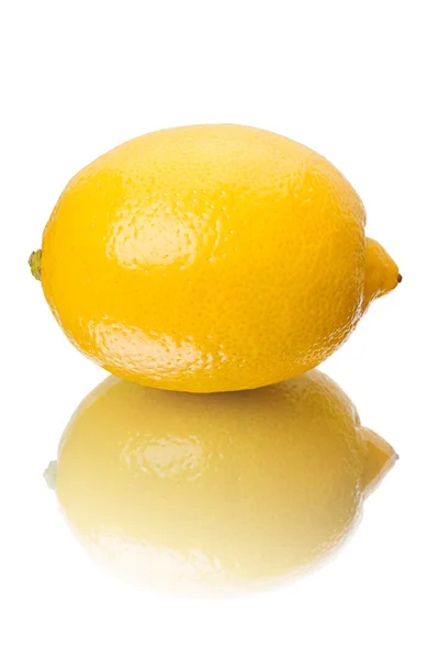 Lemon with a reflection on white — Stock Photo, Image