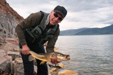 Fishing in Mongolia clipart