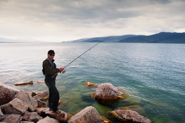 Fishing in Mongolia clipart
