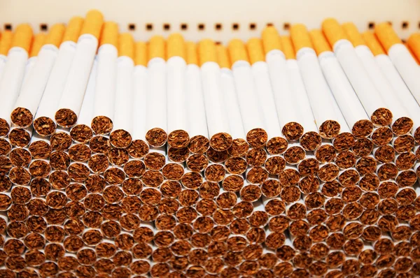 Roken van sigaretten in een stapel — Stockfoto