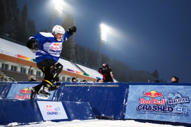 Competitors race at the Redbull Crashed Ice, Ice cross clipart