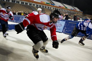 Competitors race at the Redbull Crashed Ice, Ice cross clipart