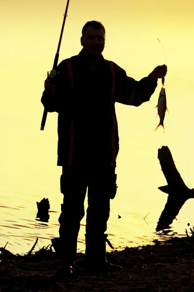Silhueta de pescador — Fotografia de Stock