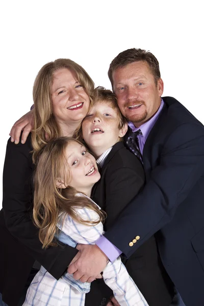 Carino famiglia posa su sfondo bianco — Foto Stock