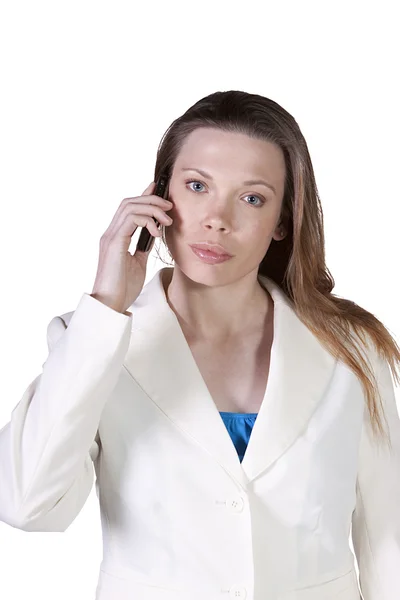 Kobieta rozmawia przez telefon komórkowy w pracy — Zdjęcie stockowe