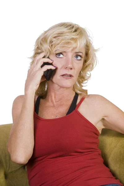 Mujer hablando por teléfono móvil en su casa —  Fotos de Stock