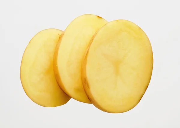 Pokrojonych w plasterki ziemniaków — Zdjęcie stockowe