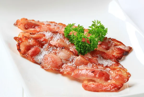 Fried bacon strips — Stock Photo, Image