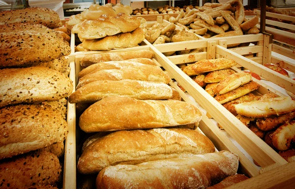 Variety of bread in a supermarket — Stock Photo, Image