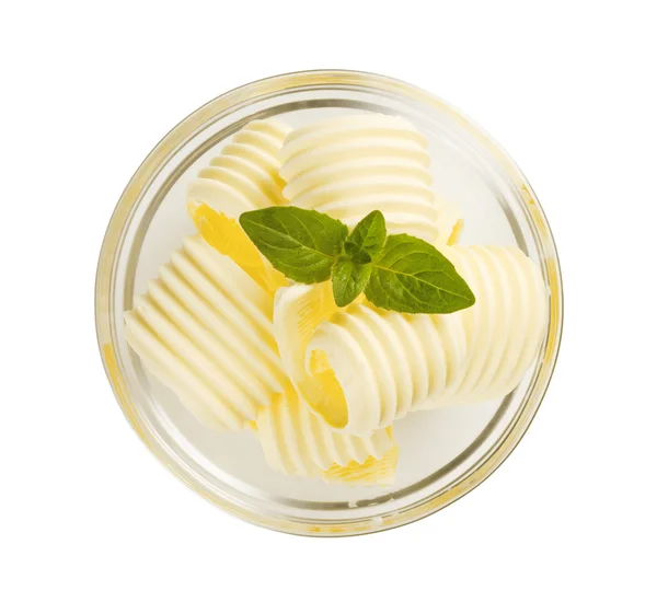 Butter curls in a glass bowl — Stock Photo, Image