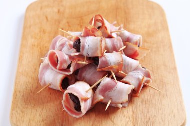 Bacon wrapped prunes clipart