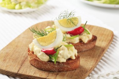 Toasted bread and egg spread clipart