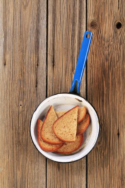 Toasted bread in a pan — Stock Photo, Image