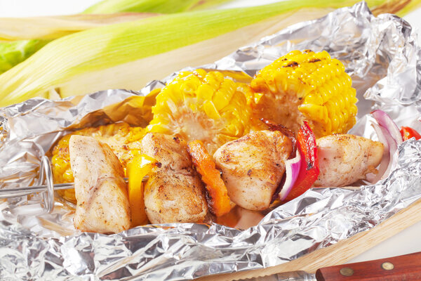 Shish kebab and grilled corn