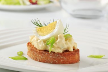 Toasted bread and egg spread clipart