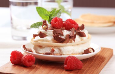 Pancakes with sweet cheese and raspberries clipart