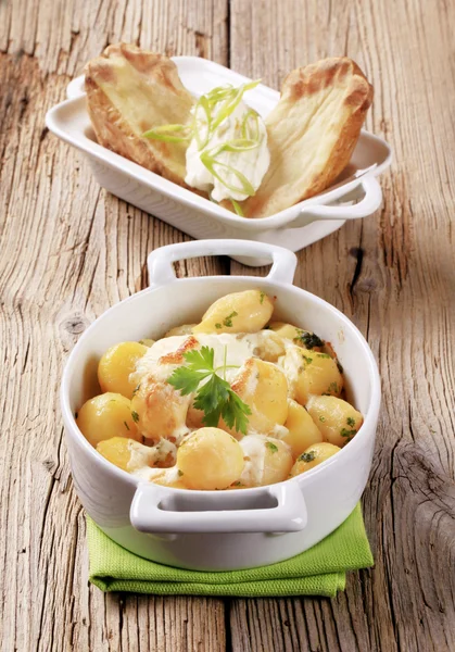 Potatoes and sour cream — Stock Photo, Image