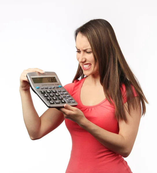 Giovane donna in possesso di una calcolatrice — Foto Stock