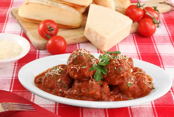 Italian meatballs in an oval dish. — Stock Photo, Image