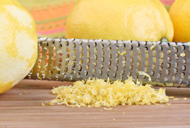 Lemon zest in macro with selective focus on zest. clipart