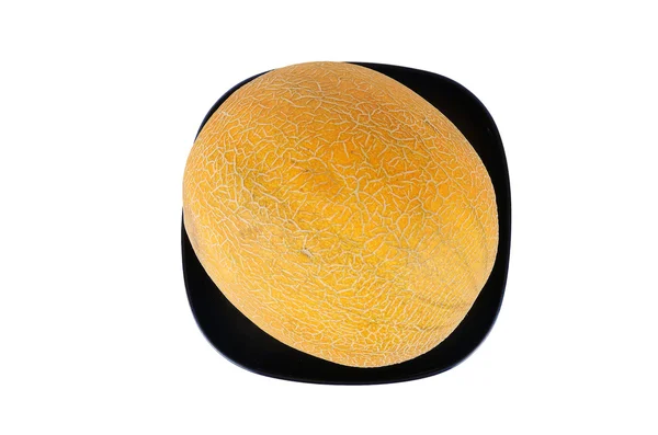 Martwa natura z naturalnych dojrzały melon na czyste białe tło — Zdjęcie stockowe