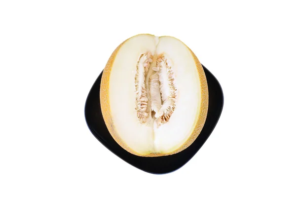 Natureza morta com um melão maduro natural em um fundo branco limpo — Fotografia de Stock