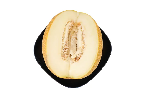 Naturaleza muerta con un melón maduro natural sobre un fondo blanco limpio — Foto de Stock