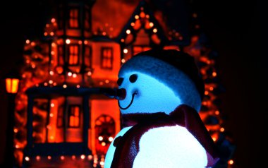 Glowing from within snowman. Christmas decoration clipart