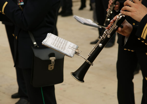 Marching military band at the parade. Clarinet