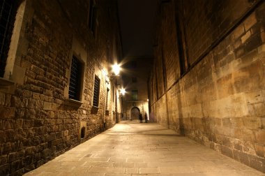 Gothic quarter at night. Empty alleyways in Barcelona clipart