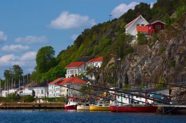 Boats in Risor, Norway clipart