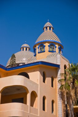 Colorful tiled dome Mexican building clipart