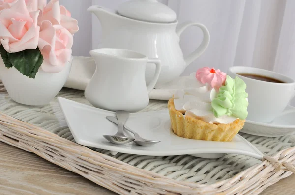 Cake with a cup of coffee on a tray — Stock Photo, Image