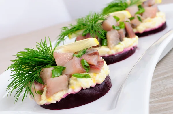 Appetizer with herring — Stock Photo, Image