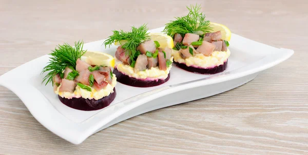 Appetizer with herring and beets — Stock Photo, Image
