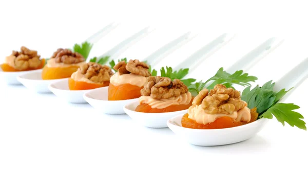 Apricot stuffed with creamy apricot stuffing with walnuts — Stock Photo, Image