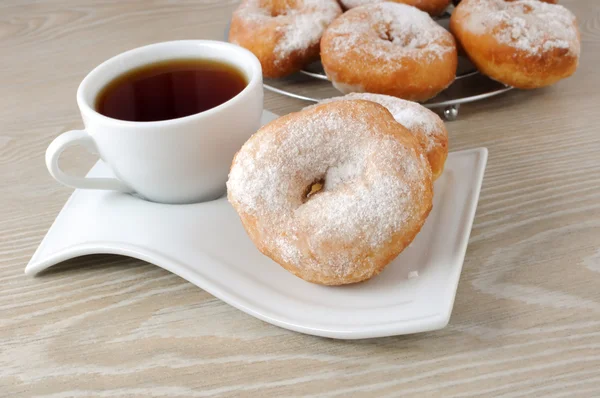 stock image A cup of coffee and donuts