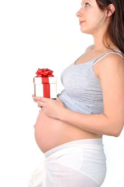 Donna incinta con regalo Immagine Stock