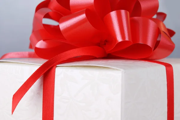 Box with red bow — Stock Photo, Image