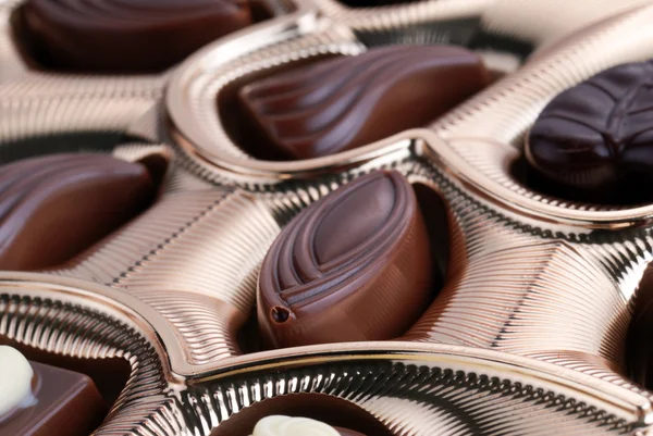 Chocolates in foil box — Stock Photo, Image
