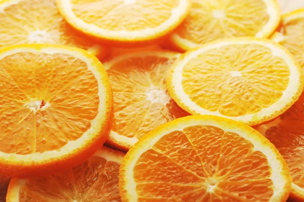 背景所作的多汁的橙子 图库照片