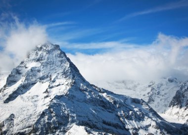 High snow mountains not far from Elbrus clipart