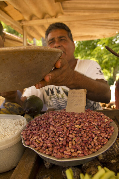 A man sells beans