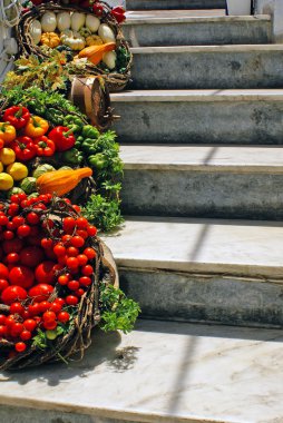Food Baskets on steps in Santorini island, Grecee clipart