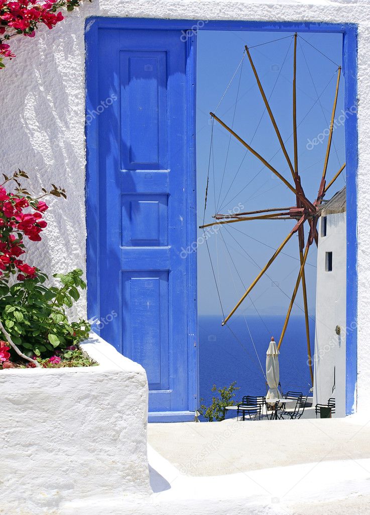 Traditional windmill of Oia at Santorini island in Greece