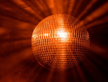 Disco ball with rays in haze clipart