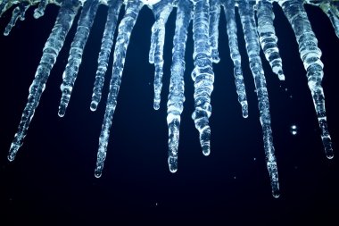 Icicles at night clipart