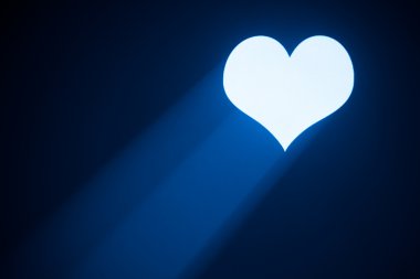 Valentine heart projected with blue ray clipart
