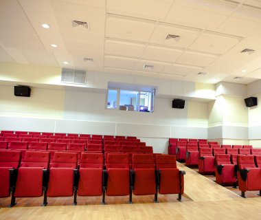 Red chairs in the hall clipart